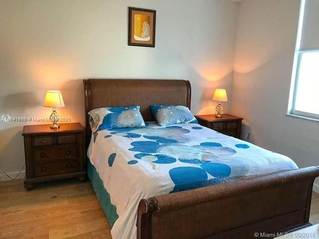 bedroom featuring light wood-type flooring