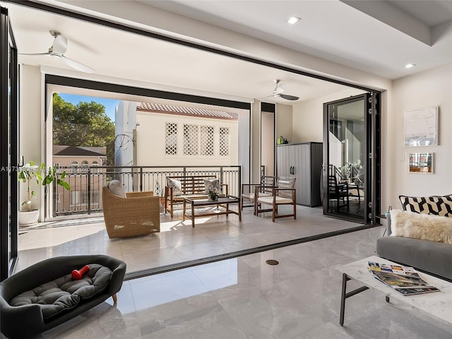 living room with ceiling fan