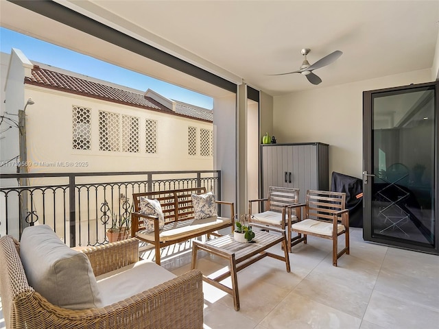 view of patio featuring an outdoor hangout area and ceiling fan