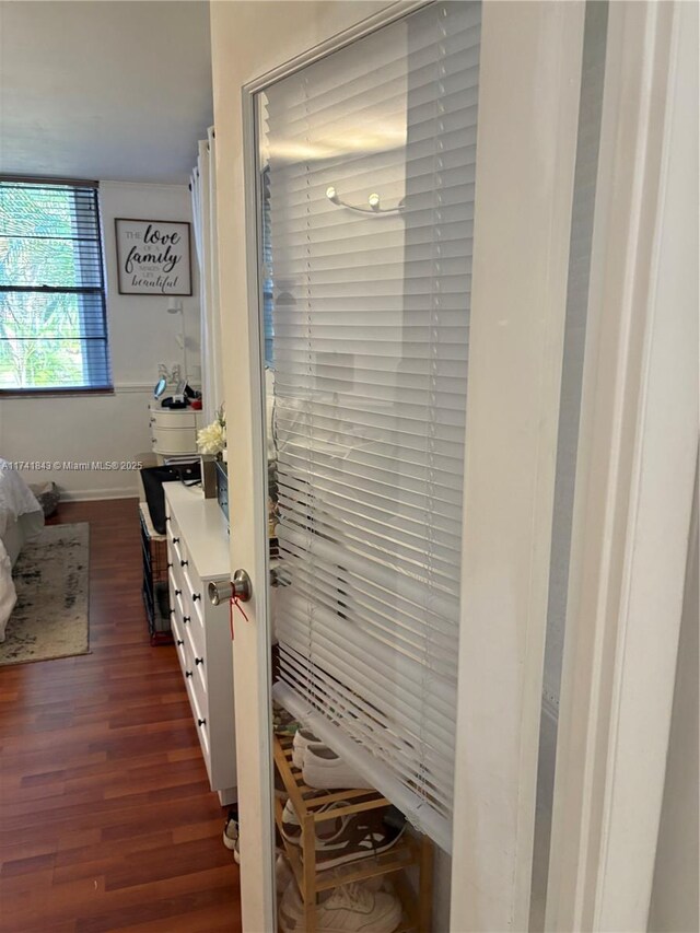 bathroom with wood-type flooring