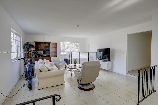 living room with light tile patterned floors