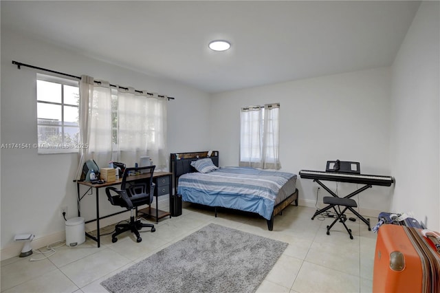 bedroom featuring light tile patterned floors