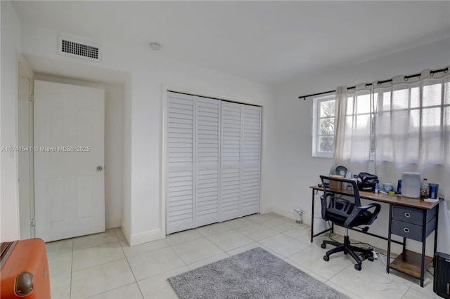 office featuring light tile patterned flooring