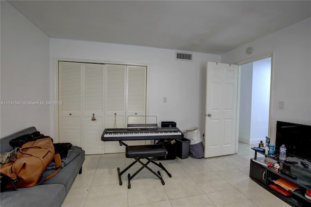 misc room featuring light tile patterned flooring