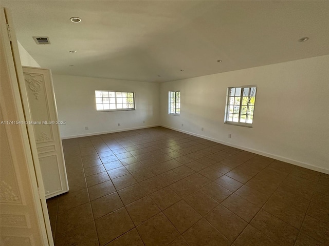 view of tiled spare room