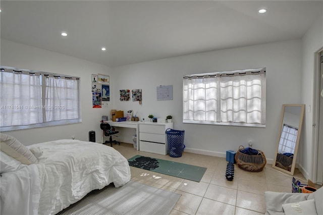 bedroom featuring light tile patterned floors