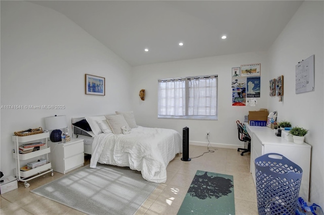 tiled bedroom with lofted ceiling