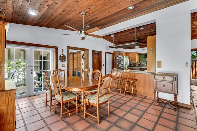 dining space with french doors, ceiling fan, wood ceiling, and vaulted ceiling