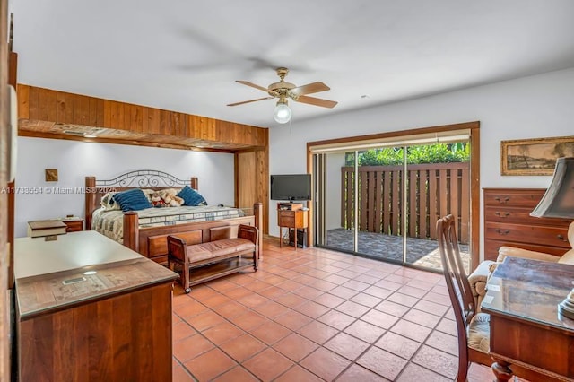 bedroom featuring ceiling fan, access to outside, and light tile patterned floors