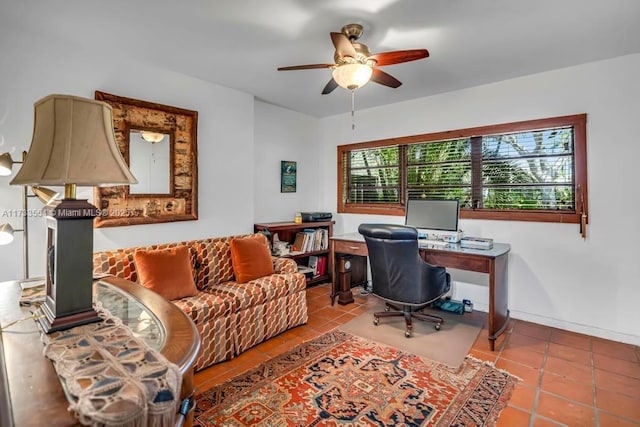 office area featuring light tile patterned floors and ceiling fan