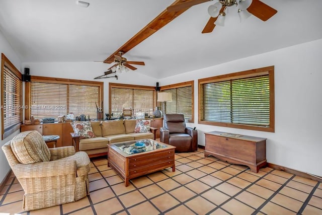 tiled living room with lofted ceiling with beams, plenty of natural light, and ceiling fan