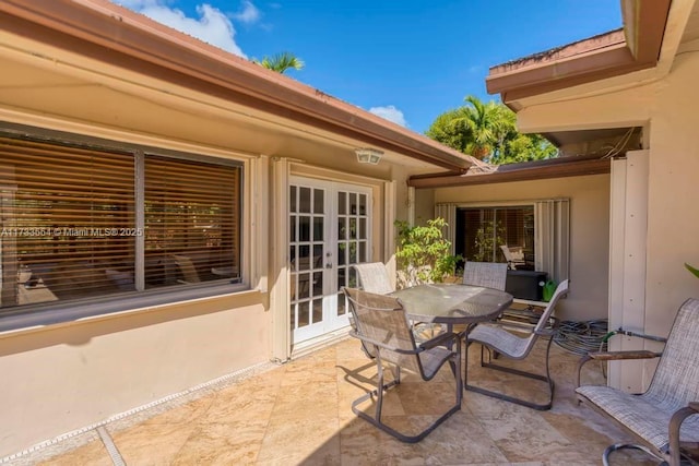 view of patio / terrace featuring french doors