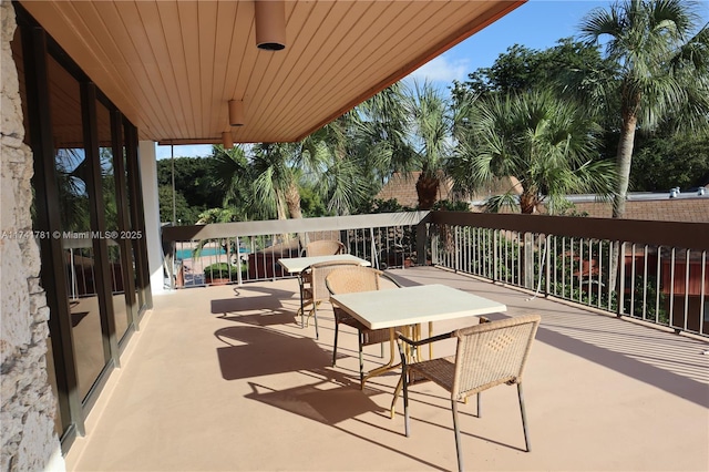 view of patio / terrace with a balcony