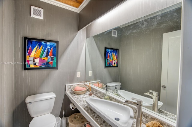 bathroom with toilet and sink