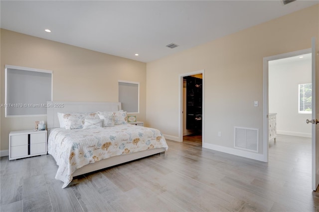 bedroom featuring light hardwood / wood-style floors