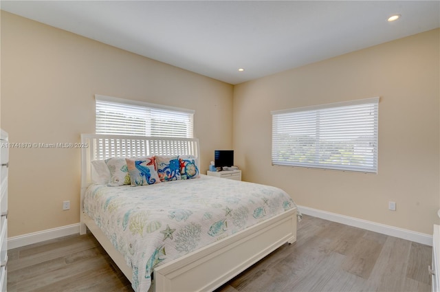 bedroom featuring light wood-type flooring