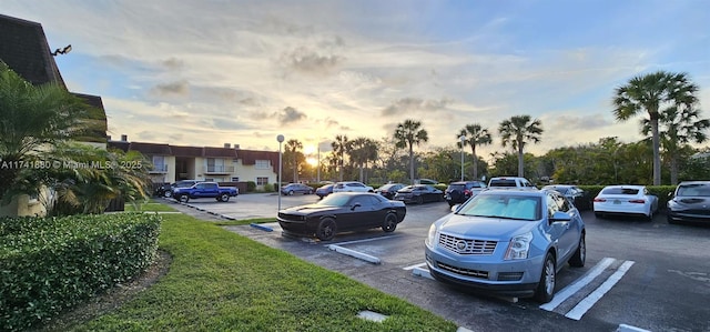 view of parking at dusk