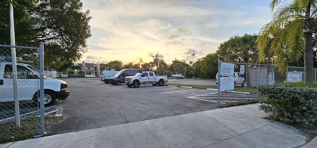 view of parking at dusk