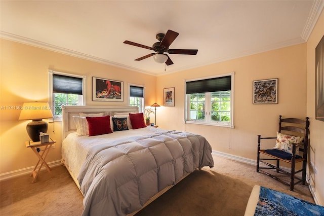 bedroom with multiple windows, ornamental molding, and carpet flooring