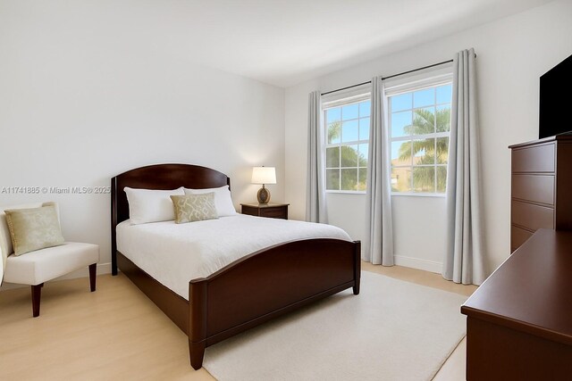 827 SW 147th Ave Unit 1406, Pembroke Pines, FL 33027 - bedroom with light wood-style floors