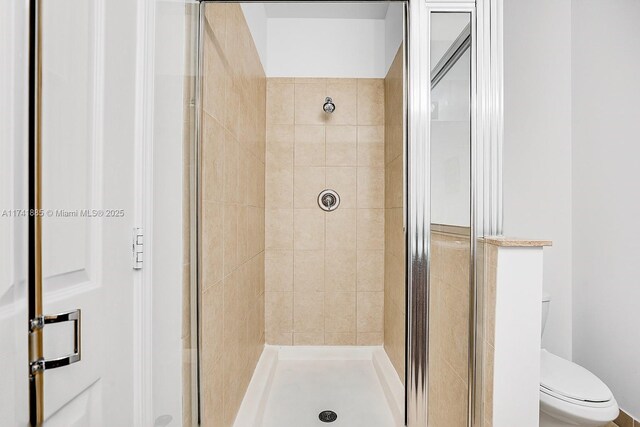 827 SW 147th Ave Unit 1406, Pembroke Pines, FL 33027 - bathroom featuring a shower stall and toilet