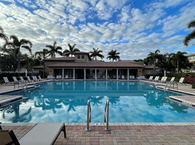 827 SW 147th Ave Unit 1406, Pembroke Pines, FL 33027 - community pool featuring a patio