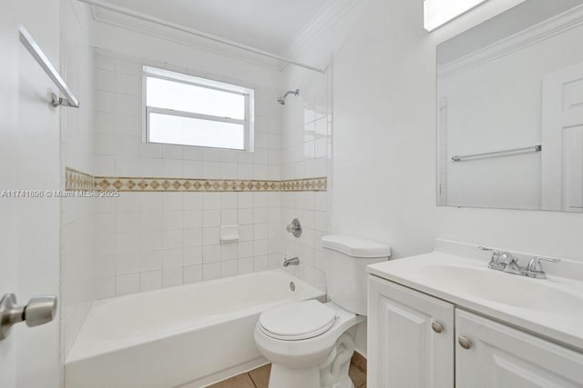 bathroom with shower / bathing tub combination, toilet, ornamental molding, vanity, and tile patterned floors