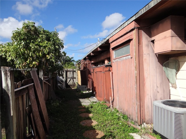 view of property exterior with cooling unit