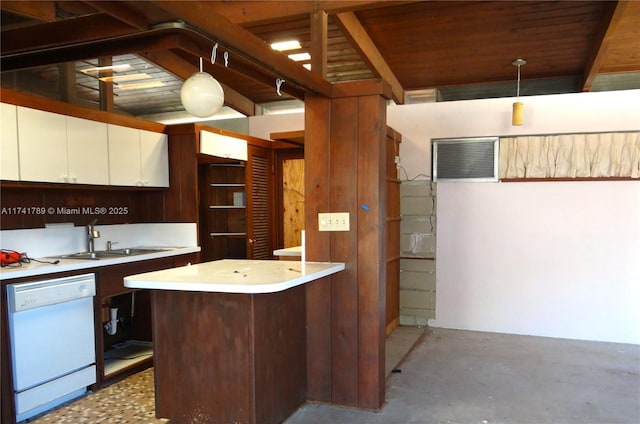 kitchen with white dishwasher, pendant lighting, beamed ceiling, sink, and white cabinetry