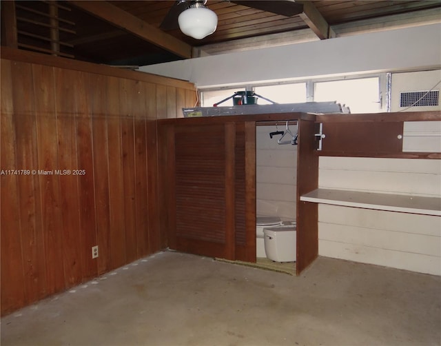 basement with wooden walls