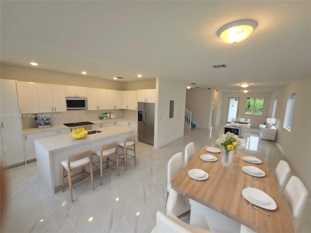 dining space featuring electric panel