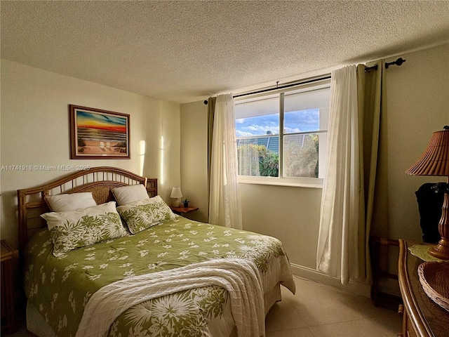 bedroom featuring a textured ceiling