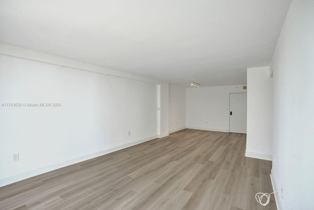 empty room featuring light hardwood / wood-style floors