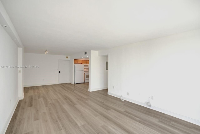 empty room featuring light hardwood / wood-style floors