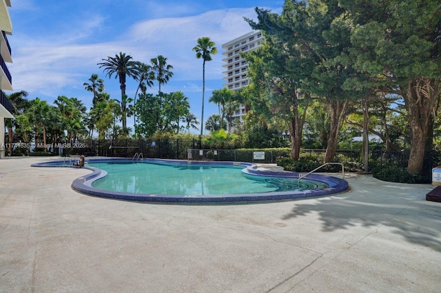 view of pool featuring a patio