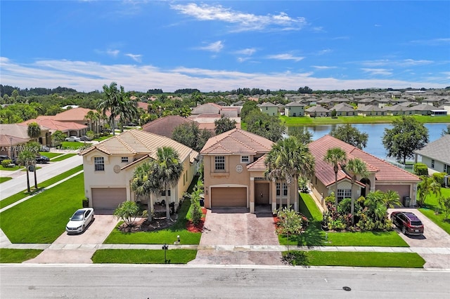 bird's eye view with a water view