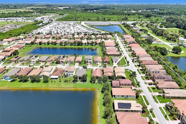 drone / aerial view featuring a water view