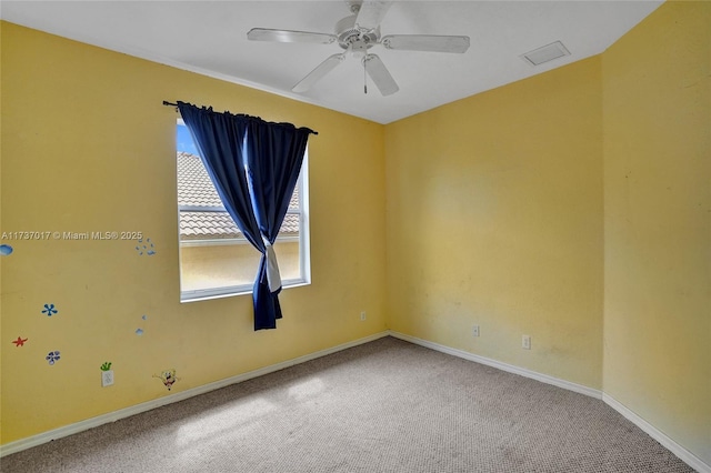 carpeted empty room with ceiling fan