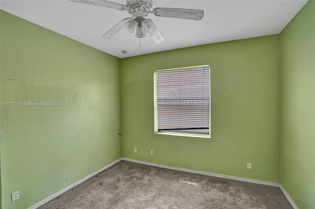 unfurnished room with light colored carpet and ceiling fan