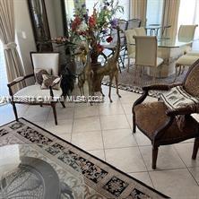 living area with tile patterned flooring