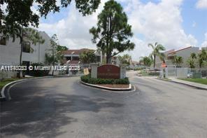 view of street with curbs