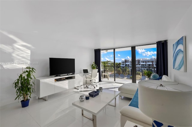tiled living room with expansive windows