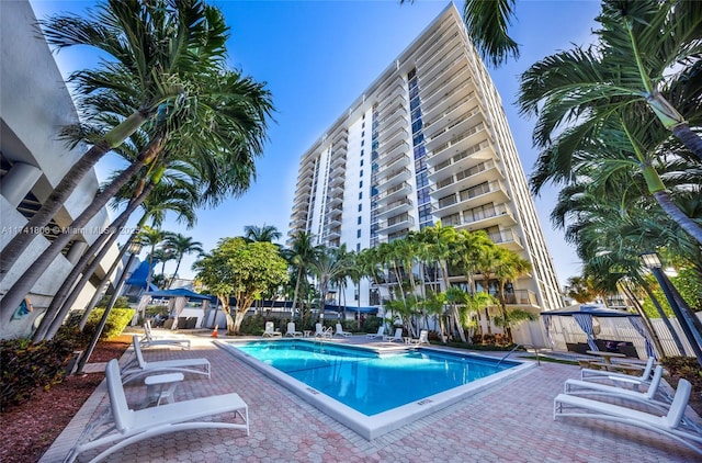 view of swimming pool featuring a gazebo and a patio area