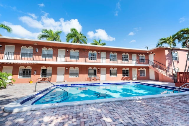 view of pool with a patio