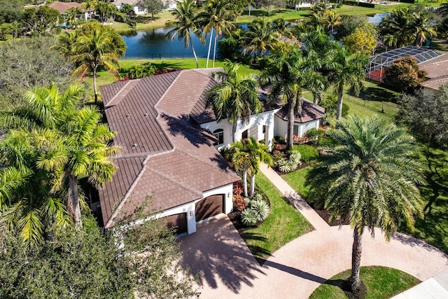 birds eye view of property featuring a water view