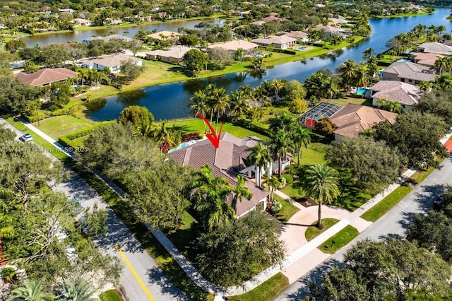 birds eye view of property featuring a water view