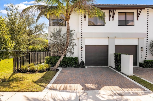 mediterranean / spanish-style home featuring a garage