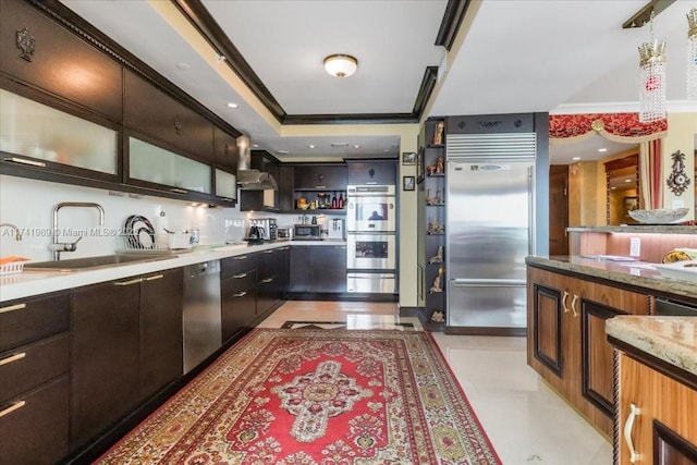 kitchen with stainless steel appliances, a sink, wall chimney exhaust hood, a warming drawer, and open shelves