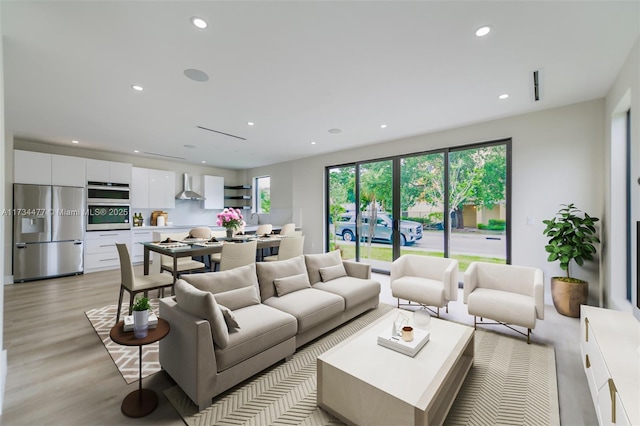 1617 NE 11th St Unit 1, Fort Lauderdale, FL 33304 - living room with light wood finished floors and recessed lighting