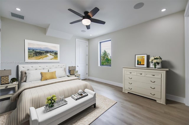 1617 NE 11th St Unit 1, Fort Lauderdale, FL 33304 - bedroom with baseboards, wood finished floors, recessed lighting, and a ceiling fan